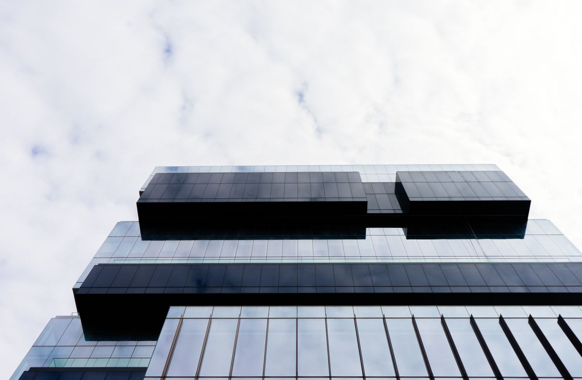 Modern office building exterior at dusk